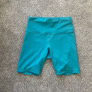 2 pairs of size 8 Lulu lemon biker shorts